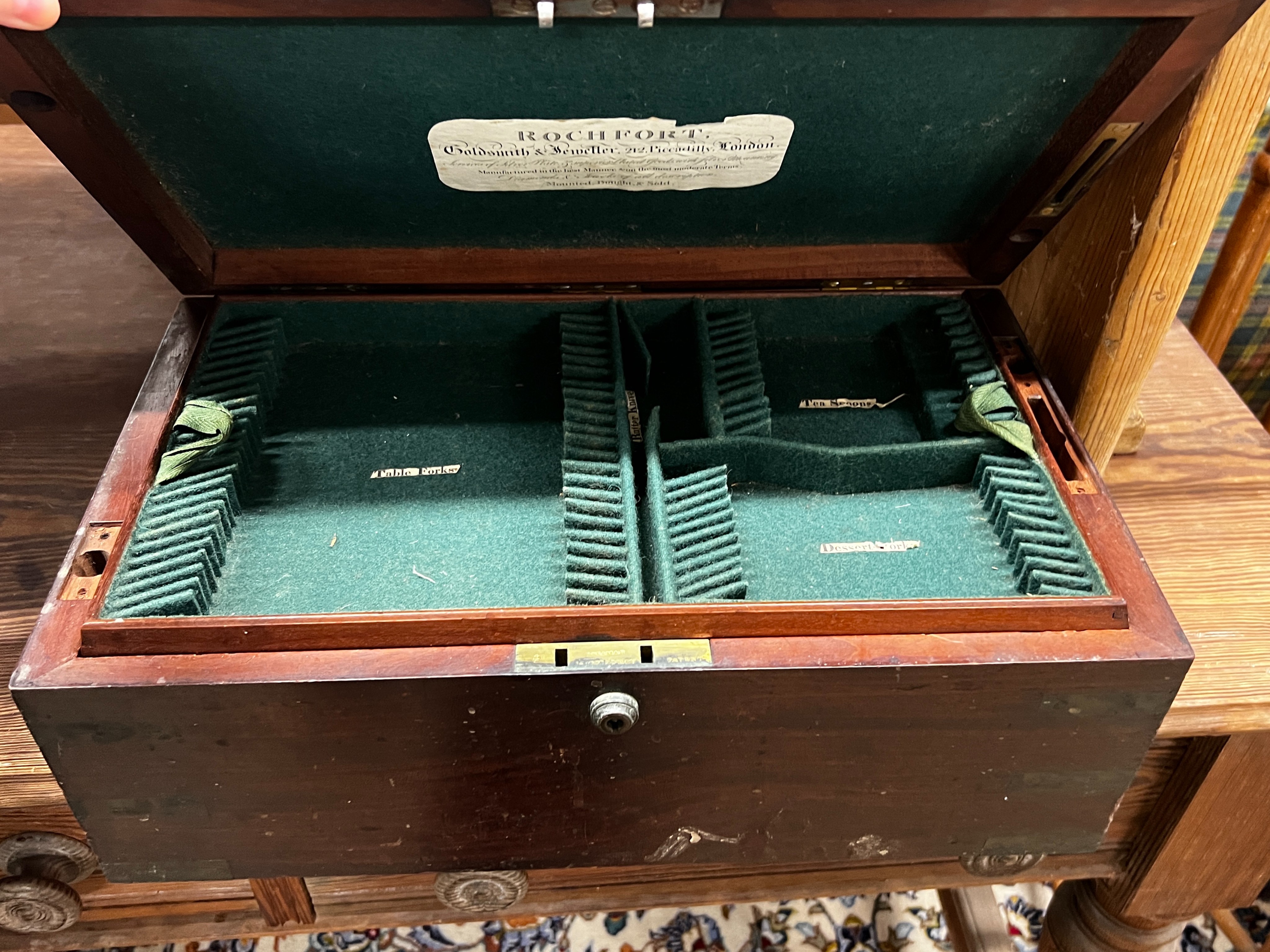 A 19th century mahogany cutlery box, width 46cm, two miniature ship's lanterns and a French inlaid mantel clock